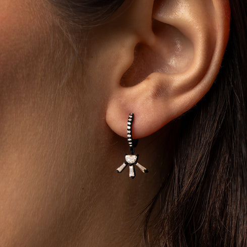 diamond half moon starburst dangle earrings in 18k black gold, on body<span class='visuallyhidden'>; shop help at 760-978-9297.</span>